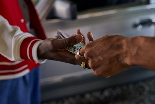 two people exchanging a security deposit