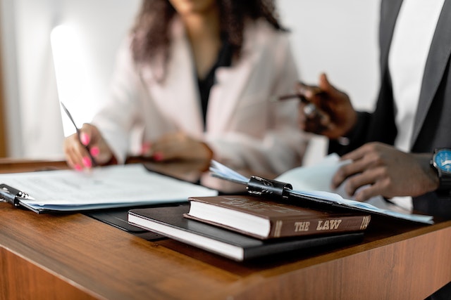 two-people-working-on-legal-documents